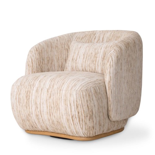 The modern CLAUDE armchair combines comfort and design, creating a perfect harmony1.