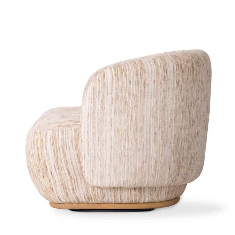 The modern CLAUDE armchair combines comfort and design, creating a perfect harmony.3