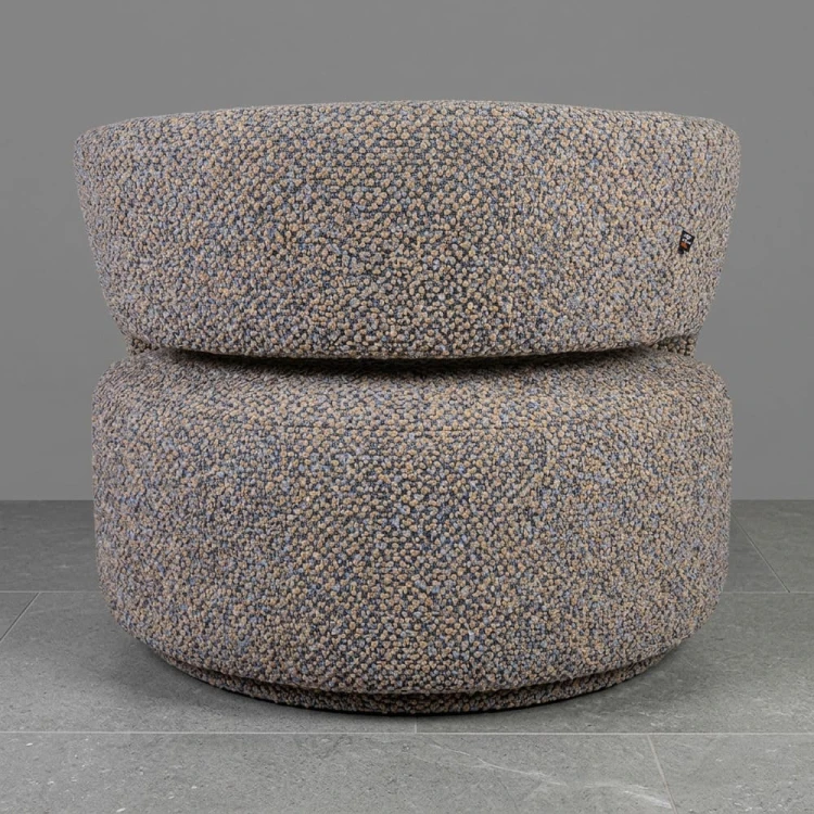Cavell Swivel Chair in Tease me boucle.jpg